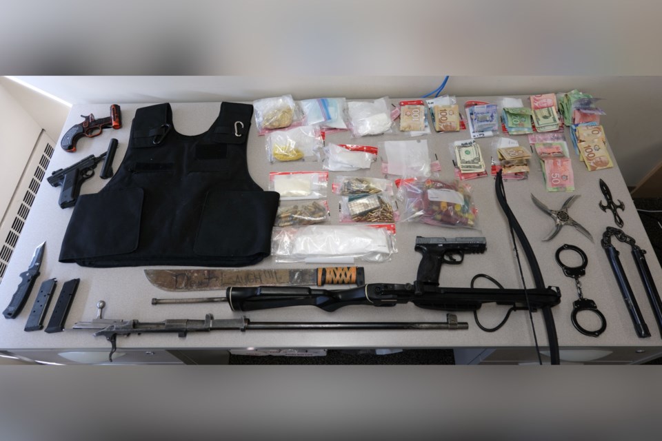 Search Warrant Yields Drugs Throwing Star Nunchucks And A Crossbow