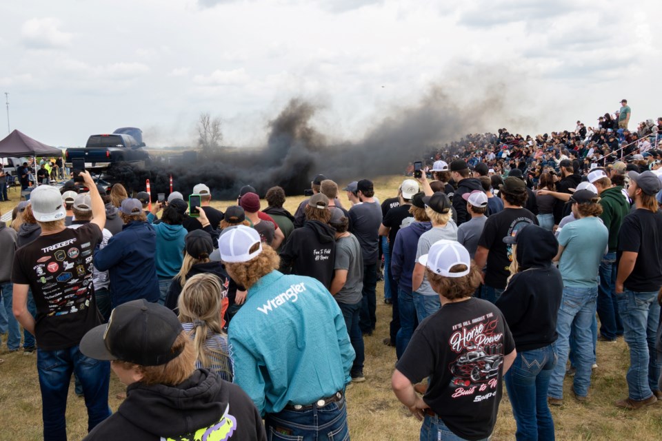 The Out West Truck Festival, held on Saturday, July 27 at the Pioneer Acres Museum near Irricana, showcased exciting stunts and a variety of trucks, drawing automotive enthusiasts from across the region