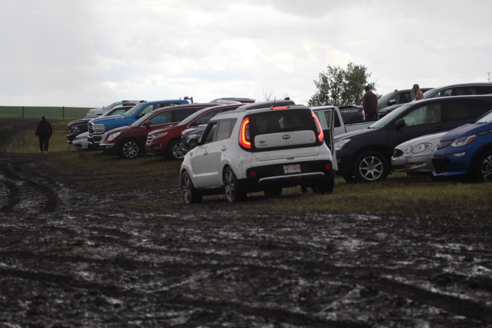 Stuck in the mud. Heavy rains made it impossible for some Airdrie Pro Rodeo goers to leave the rodeo grounds on Monday.