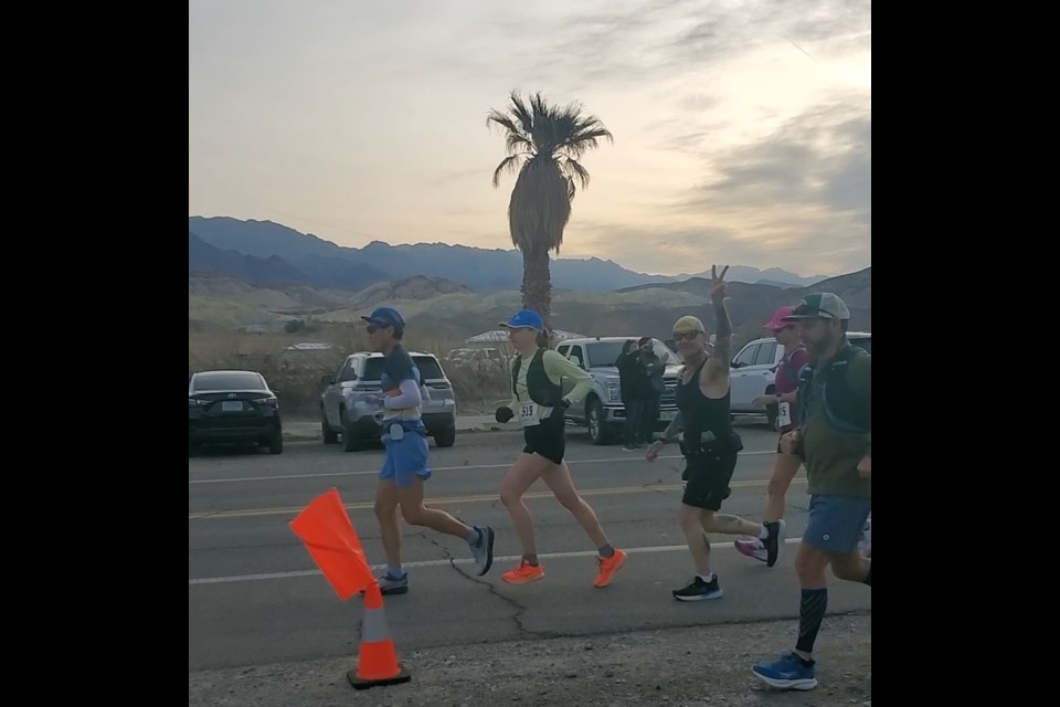 Giovanni Macagnino waves to the camera as he sets off on a gruelling 42 K marathon in Death Valley, California on Feb. 1, 2025.