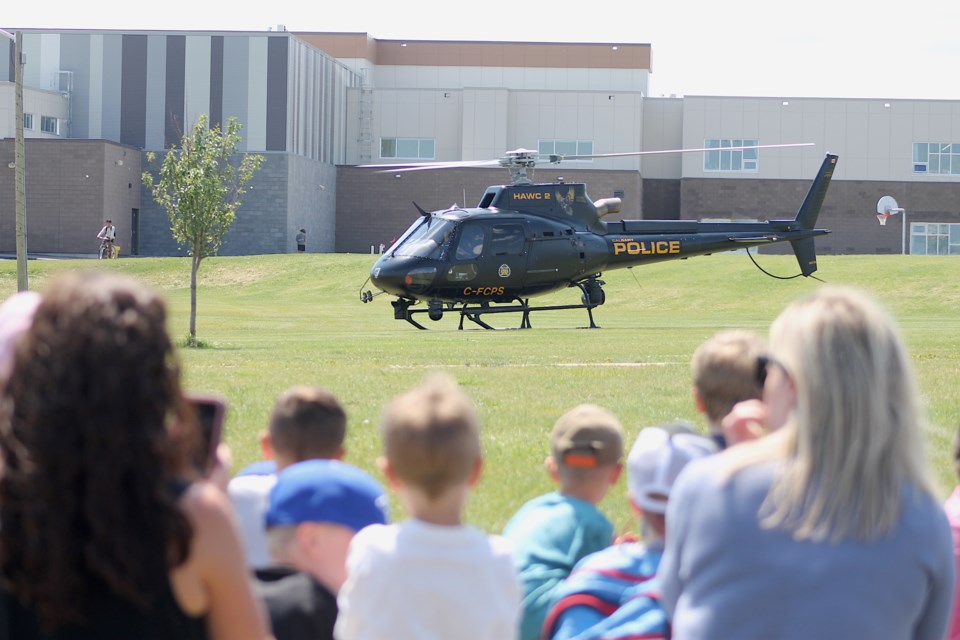 A HAWCS helicopter landed in between Fireside School and Holy Spirit School. The pre-planned spectacle a big highlight for Fireside's kindergarten class on June 23.