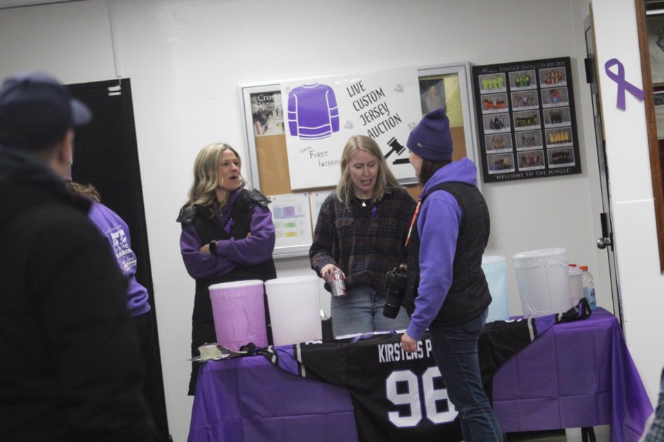 Many came out to Crossfield's Pete Knight Memorial Arena to help raise awareness of domestic violence and funds for Kirsten's Place women's shelter.