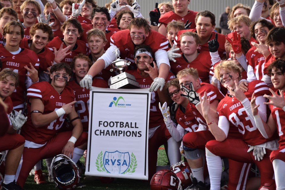 The Cochrane Cobras (red) claimed another RVSA football championship over Airdrie's George McDougall Mustangs 21-20, at Cochrane High School on October 26.  