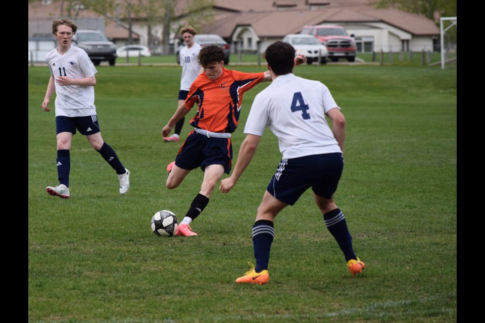 The W.H. Croxford Cavaliers (orange) beat up on the Cochrane's Bow Valley Bobcats on May 28. The Cavaliers won the game 6-1 and will move onto the second round of the 2024 RVSSA soccer playoffs. 