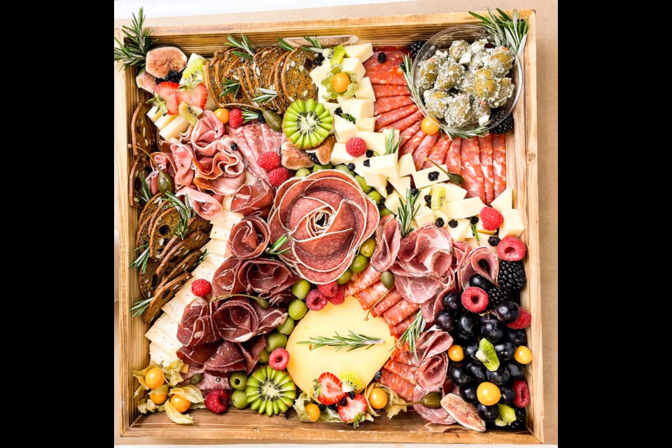 Make a showstopping charcuterie board on your own, or pick one up ready-made, like this one from Italian Centre Shop. Photo supplied.