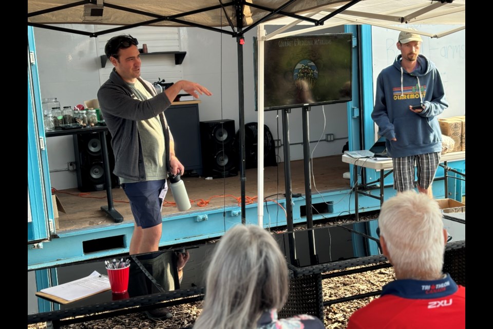 Brandon Hebor, left, gives a presentation during the evening.