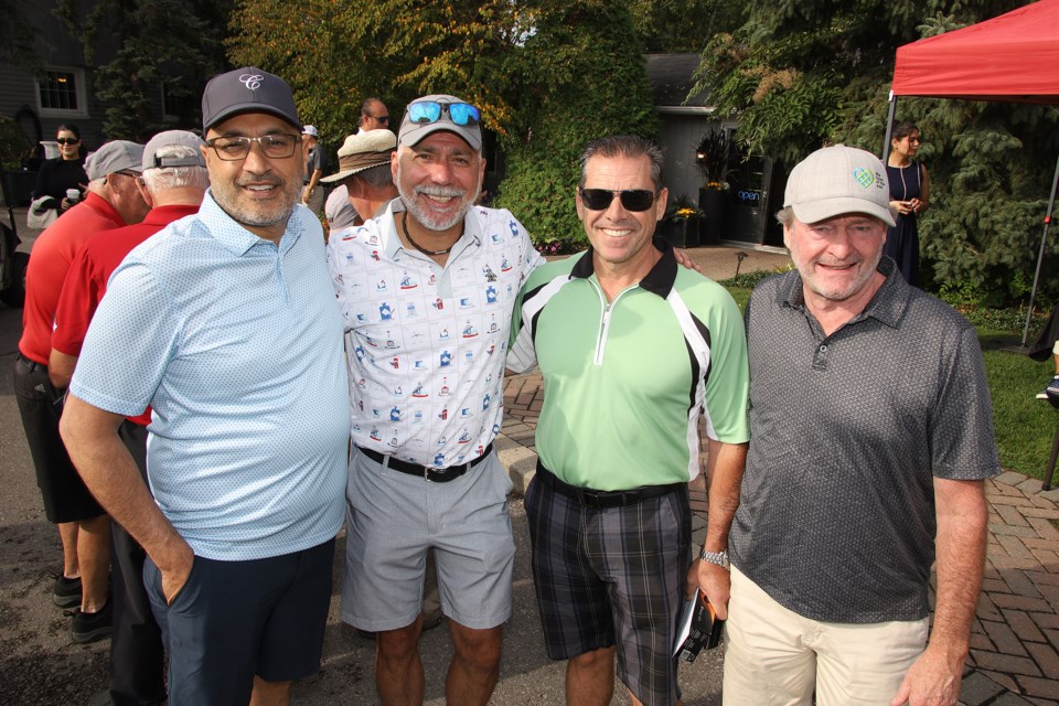 Hans Jain, Durval Terceira, and Mike Yorke from Atria Development with Aurora Mayor Tom Mrakas at St. Andrew's Valley Golf Club. The Aurora Mayor’s Charity Golf Classic raised more that $80,000 this year and is donating a total of $103,000 to 21 local groups and charities.