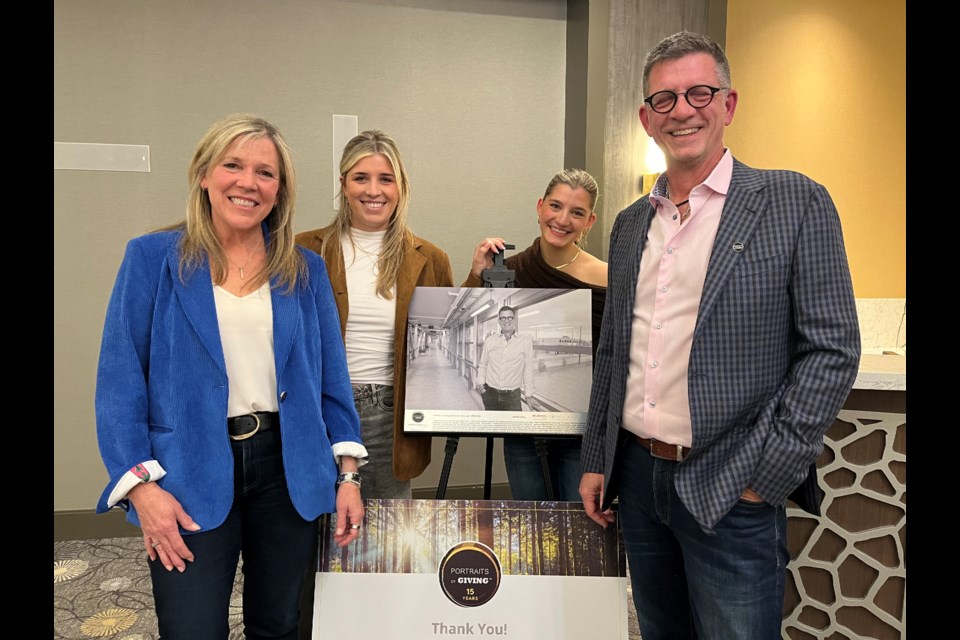 Portraits of Giving honouree for Aurora, Chris Neal, is joined by his wife Wendy and daughters Sarah and Zoe at the celebration at Delmanor Aurora Nov. 13.