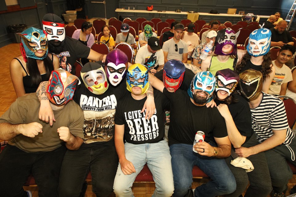 Local fans, like these from Newmarket Brazilian Jui-Jitsu, came out to see their favourite wrestlers from across Ontario at the GCW Live Wrestling charity event at Aurora Royal Canadian Legion Branch 385 Saturday night. 