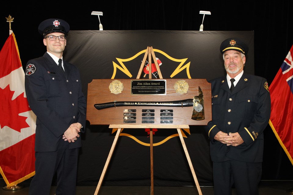 Central York Fire Services firefighter Martin Maurice is the recipient of the Central York Fire Services Jim Allen Award, introduced in 2018 in recognition of retired Captain Jim
Allen for his contributions to fire services locally and provincially during his 37-year career. He receives his award from retired Capt. Jim Allen himself at the services' annual recognition ceremony at its Aurora station last night.