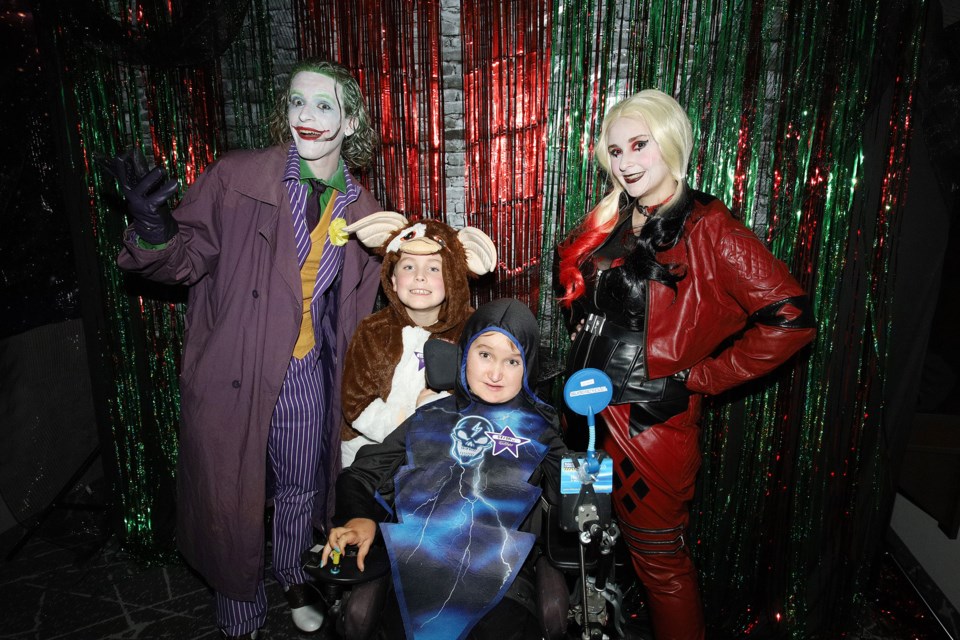 Lionel and Orson, posing here with The Joker and Harley Quinn, are among 100 family members from the Greater Toronto Area at Starlight Children’s Foundation Canada's special Halloween celebration, Trick or Suite, at the Microtel Inn & Suites by Wyndham Aurora Oct. 19.