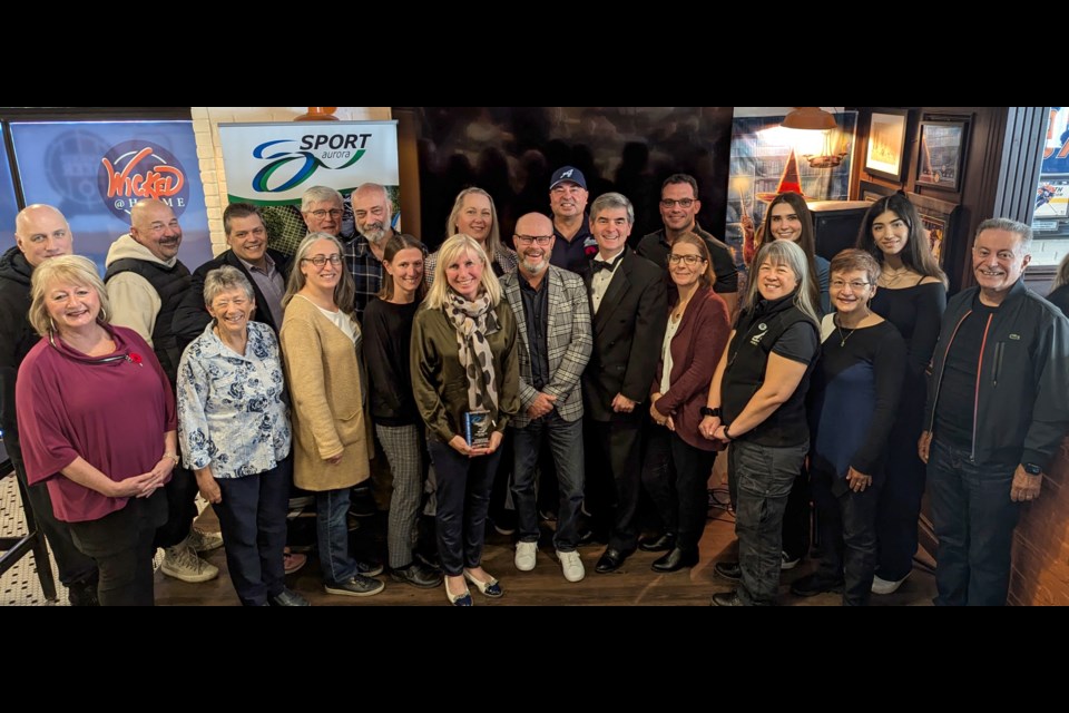 Sport Aurora Volunteer Award recipients are shown with local dignitaries and Sport Aurora representatives.