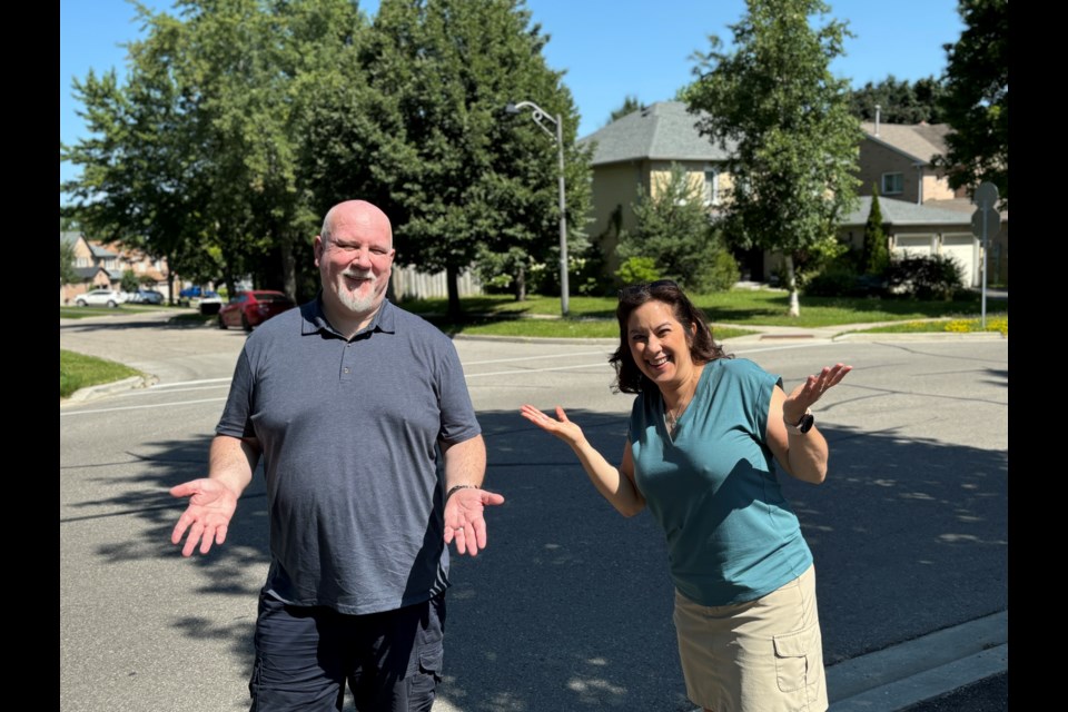 Ed Sabine and Christina Choo-Hum have both had trouble with a new stop sign outside their houses on Tamarac Trail.