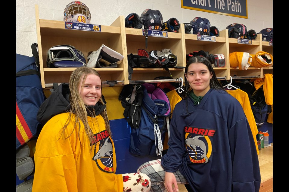 Amelia Wilkinson, left, and Sonia Mehta have had the chance to play on Team Ontario and have dreams of playing hockey as long as they can.