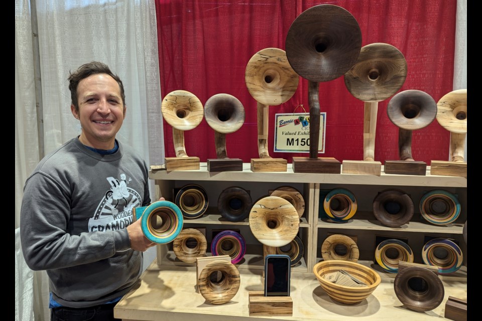 Neill Nucifora, of Baker Street Creations, is shown with his handmade wooden gramophones at the Barrie Christmas Arts and Crafts Show on Saturday at Sadlon Arena.