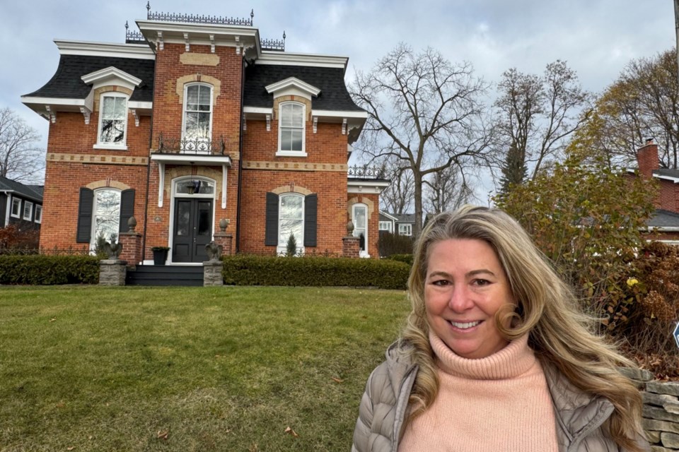 Pauline Stevenson stands in front of her Collingwood Street home in Barrie's east end. The home will serve as the setting for the latest Talk Is Free Theatre production, starting today.