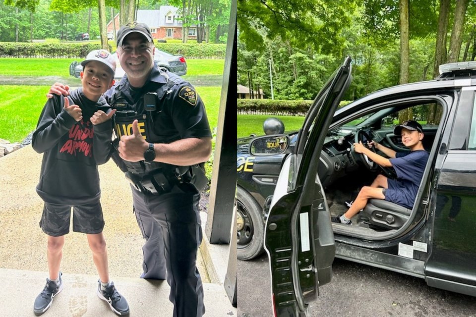 Matthew Stewart, 11, won the chance to spend the day with Huronia West OPP Const. Mike Osborne through a raffle at his elementary school.