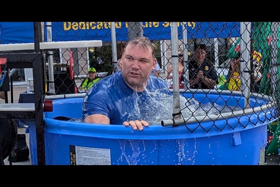 Barrie Mayor Alex Nuttall comes up for air after being dunked in Saturday's Youth Haven fundraiser.