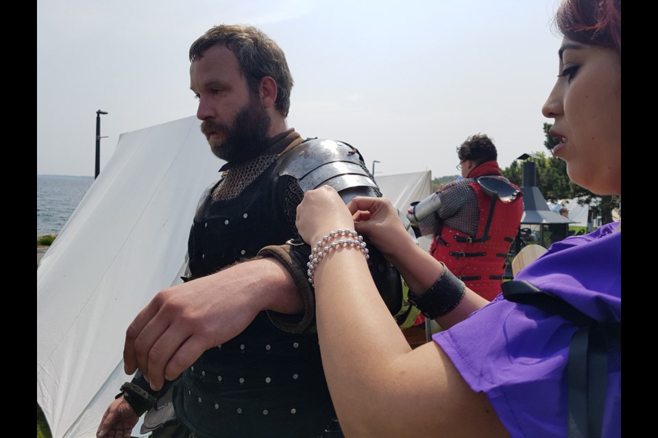 Kieron Rowe gets suited up for the duel that awaits him as part of the Medieval Swordplay Canada demostration, June 1, 2019. Shawn Gibson/BarrieToday