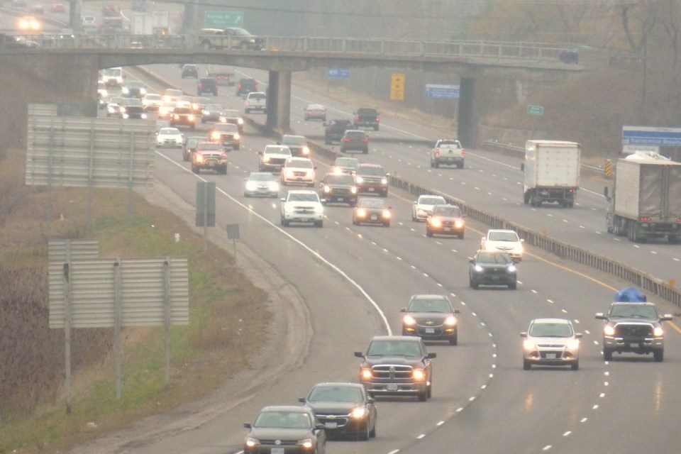 Highway 400 traffic heads through Barrie as seen from the Sunnidale Road bridge. Bob Bruton for BarrieToday