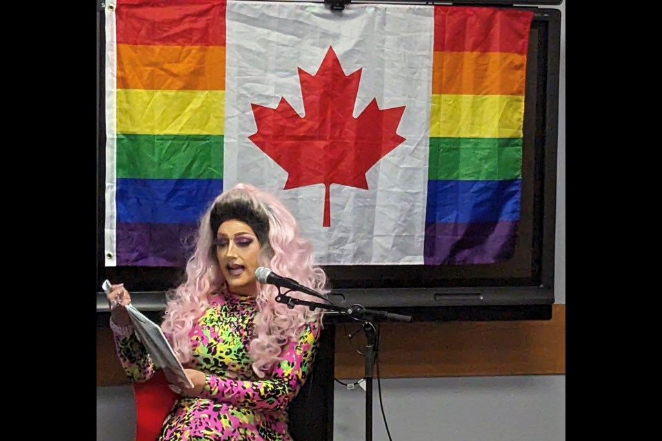 Justine reads to children during Drag Queen Storytime at Barrie Public Library