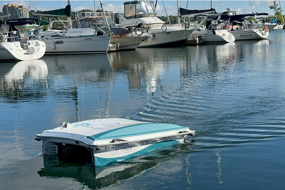 The PixieDrone — a remotely operated, mobile waste collector capable of navigating bodies of water to remove floating debris, including organic, plastic, metal, and paper — does its thing in the water by the Barrie Marina.