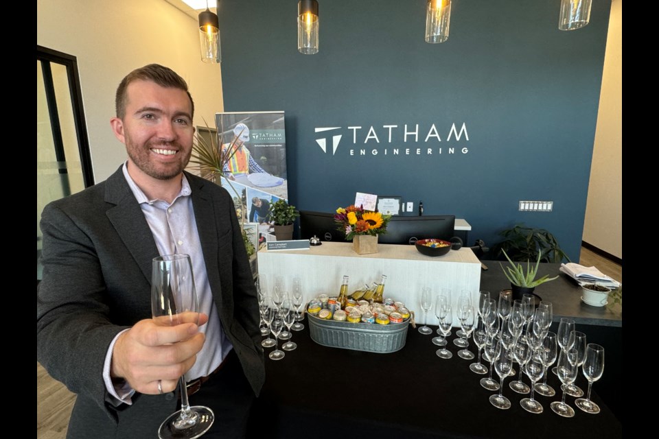 Nick Millington, manager of Tatham Engineering's Barrie office, prepares to celebrate with clients and staff during an event on Sept. 27.