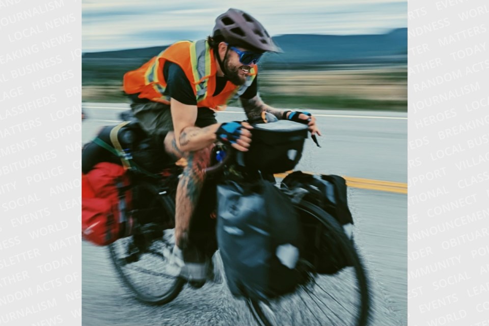  James Deer gains some speed while biking in Newfoundland.