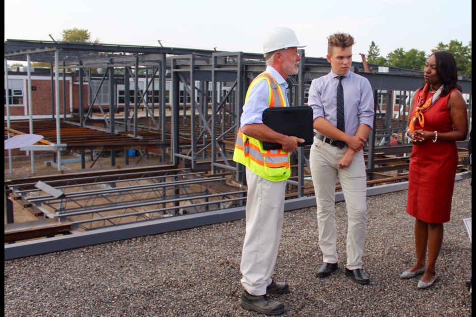 Project Co-ordinator Peter Tushingham and Barrie North Collegiate student Zak Mattila talk with Education Minister Mitzie Hunter on the roof of Barrie North.
Robin MacLennan/BarrieToday