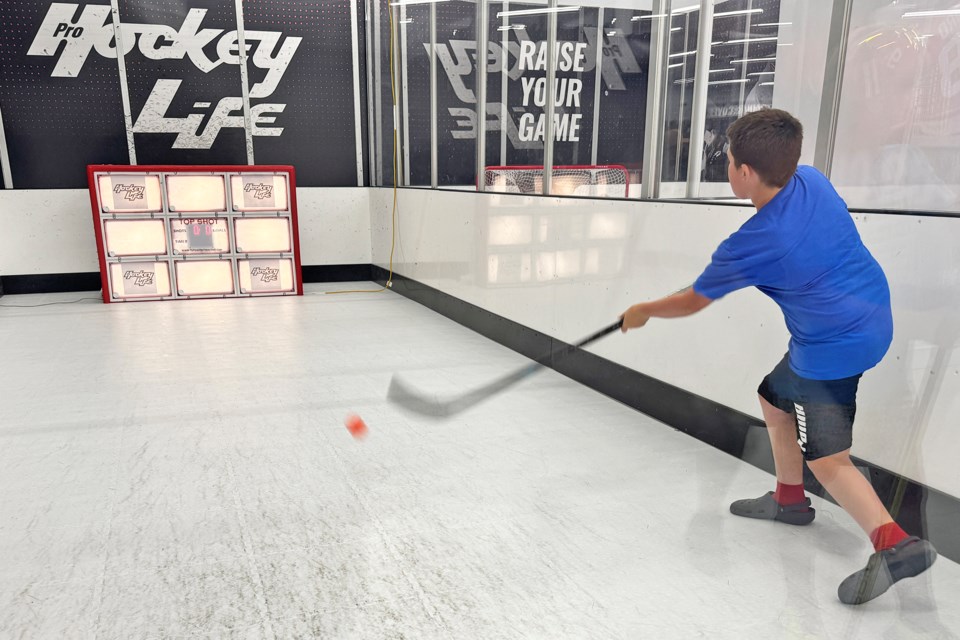 Target practice during indoor hockey activities celebrating the opening of Pro Hockey Life at 80 Concert Way in Barrie on Saturday.