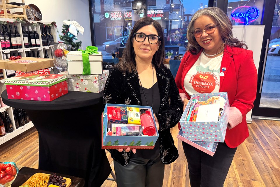 The annual Shoebox Project campaign kicked off on Friday evening at Sober Sips on Dunlop Street West in Barrie with the help of local co-ordinator Samira Rashidian-Zadeh, left, and Shannon Murree, a board member with the organization.