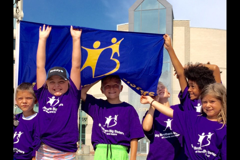 A group of Littles helped raise  the flag at city hall to mark the start of Big Brothers Big Sisters month in September. 
Sue Sgambati/BarrieToday