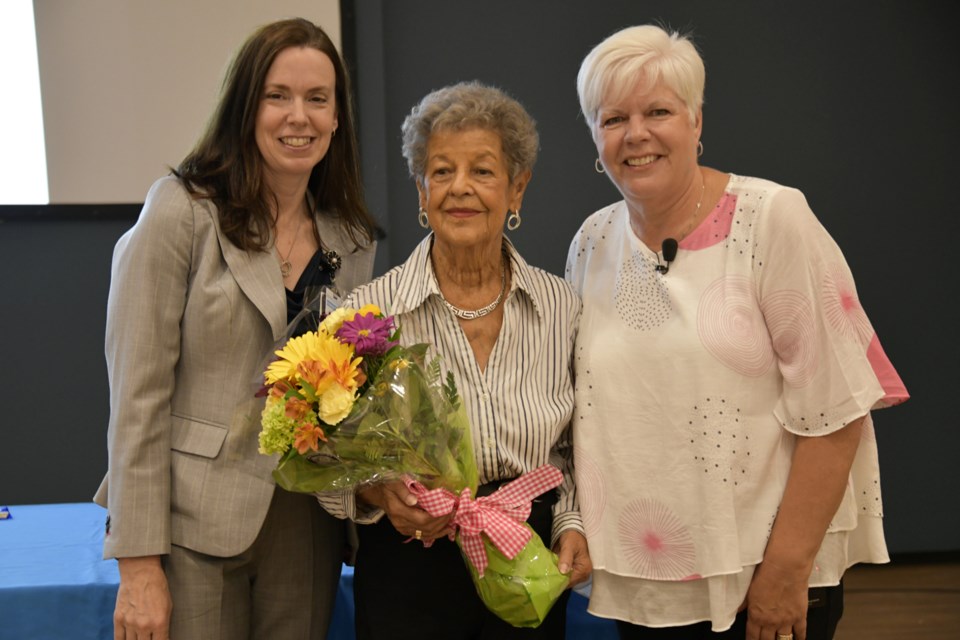 Royal Victoria Regional Health Centre president and CEO Gail Hunt and RVH Auxiliary president Lise McCourt congratulate and present Josie Hunter (centre) with her 50-year service award in a ceremony held at RVH on June 6.