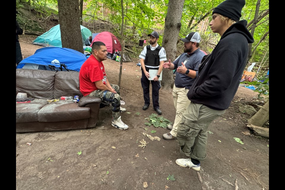 Cleanup began at Berczy Park in Barrie on Monday, as well as homeless people being evicted from the downtown site. Police were overseeing as Barrie bylaw officer tells people they need to leave. There were Busby Centre people there to assist. A crew of two workers and a truck were also removing items. 