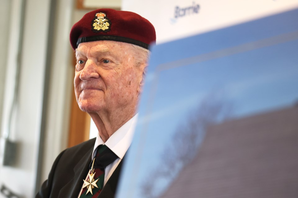 Brig.-Gen. John Hayter (ret.) speaks to the crowd gathered at the ceremony renaming the Southshore Centre in Barrie in his name, on Wednesday, May 15.