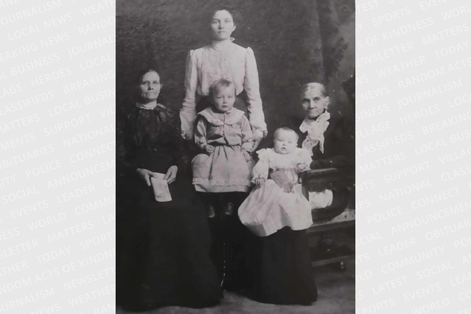A four-generation family photograph shows Everelda (Pyette) Glenn, centre, her mother, Mary Ann (Salter) Pyette, left, children William Alexander and Leon Glenn, and Margaret (Martin) Salter, right, before 1905.