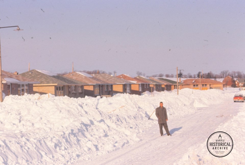 bt-then-now-267-clearing-the-road-bothwell-cres-1960