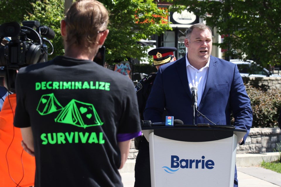 Barrie Mayor Alex Nuttall speaks at a news conference at Memorial Square addressing the city's downtown safety concerns on Thursday.