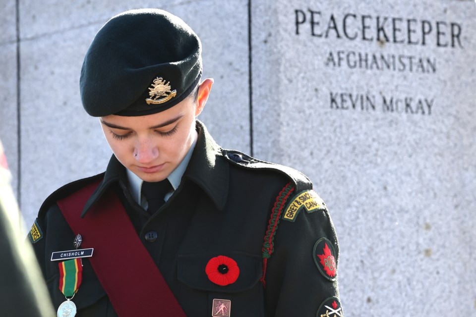 A member of the Grey and Simcoe Foresters stands guard at the Old Town Hall Cenotaph during the Oro-Medonte Remembrance Day service held on Sunday morning.