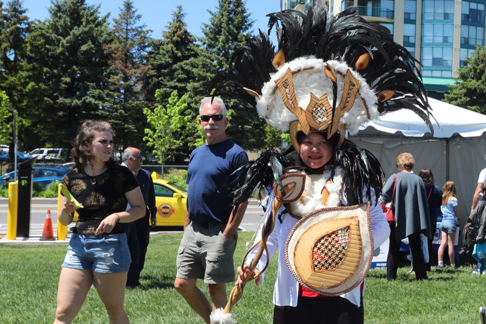 Novel Bautista shows of a festival costume at the Filipino-Canadian Association of Barrie booth at the Celebrate Barrie event held along the lakeshore on Saturday, June 2, 2018. Kevin Lamb for BarrieToday.