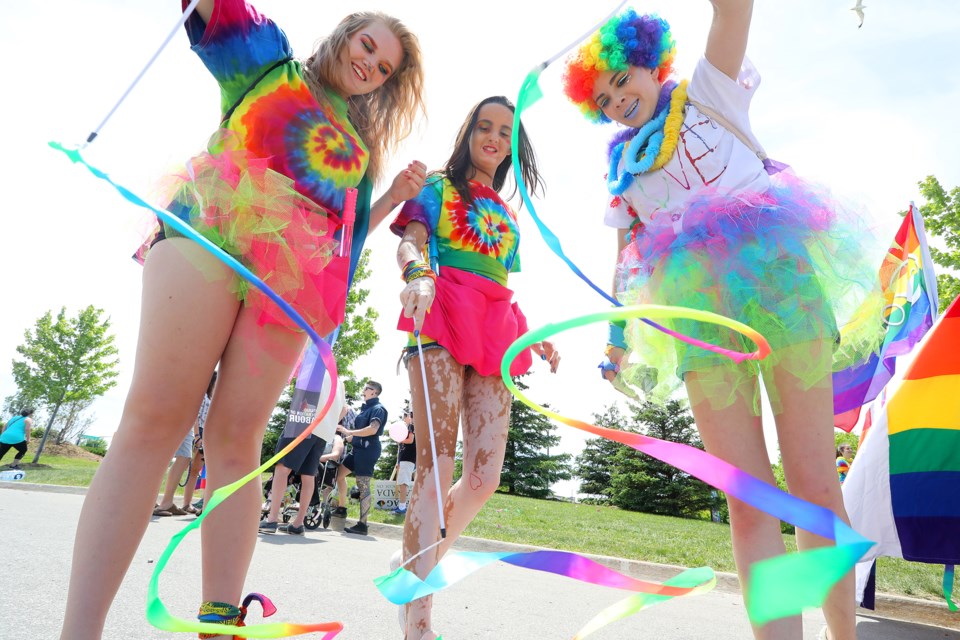 Marchers test their ribbons as they prepare for the annual Barrie Pride Parade that took place along Bradford and Simcoe streets on Sunday, June 10, 2018. Kevin Lamb for BarrieToday.