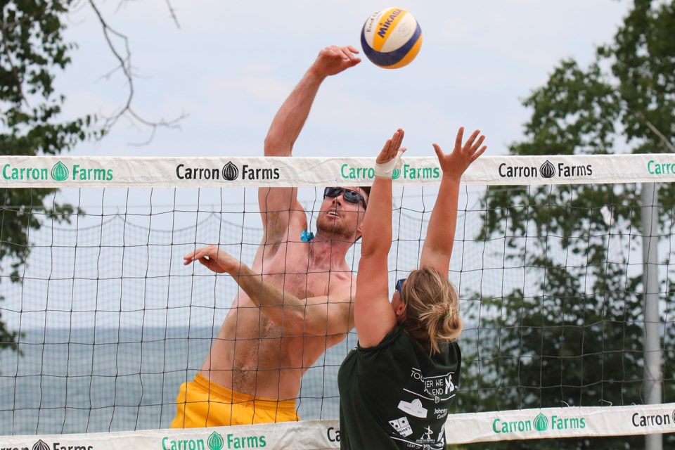 Competetive action at the 14th Annual MS Leap of Faith Beach Volleyball Tournament held at Tyndale Park in Barrie on Saturday, July 21, 2018. Kevin Lamb for BarrieToday