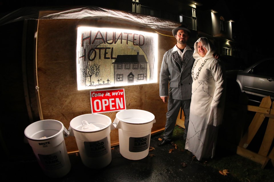 Helder and Elsa Daconceicao are hosting a 300 square foot haunted hotel that they have built on their driveway at 69 The Queensway in Barrie. Admission is a donation to the Barrie Food Bank. They hope to raise 1,000 pounds for the charity. The scary hotel is open from 7pm to 9pm on October 28, October 31, November 2, and November 3. Last year they had over 700 kids visit. Kevin Lamb for BarrieToday.