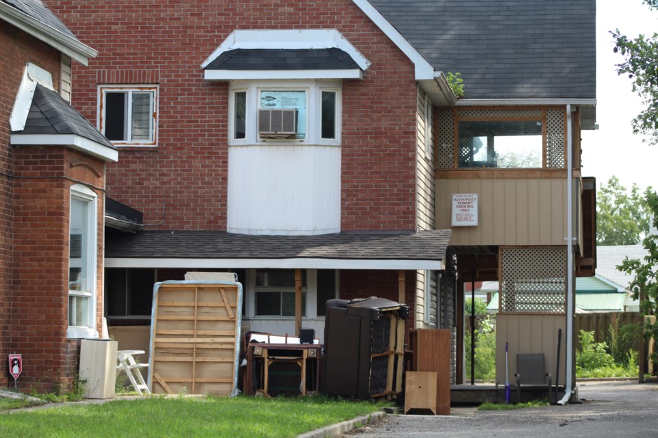 Barrie firefighters were called to this rooming house on Innisfil Street shortly before 2 a.m., Tuesday. Raymond Bowe/BarrieToday