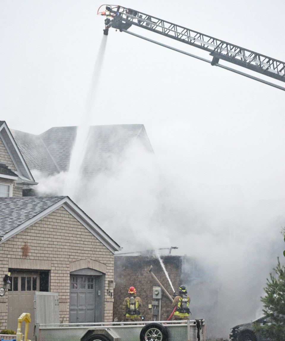 Fire crews battle heavy smoke at morning duplex blaze in Barrie ...