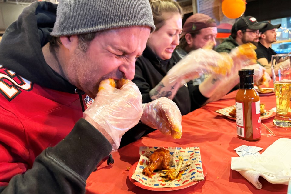 Contestants feel the heat at wing-eating contest (16 photos) - Orillia News