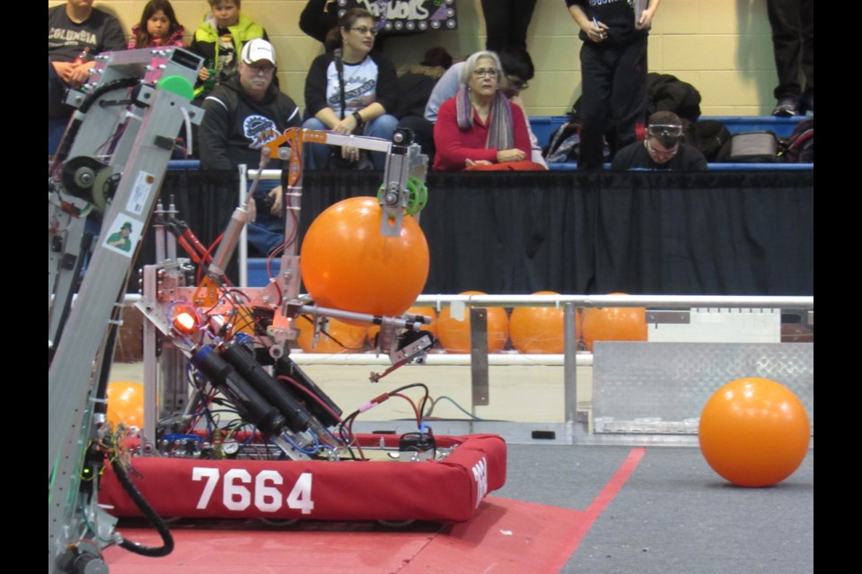 One of the robots on offense attempts to gain points by getting the ball into to hole. Shawn Gibson/BarrieToday                               