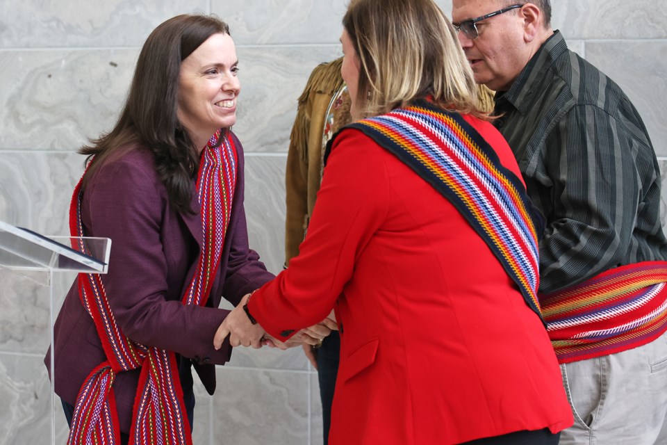 RVH president and CEO Gail Hunt, left, is presented with a sash from members of the Barrie South Simcoe Metis Council during a ceremony held on Wednesday, Feb. 14.