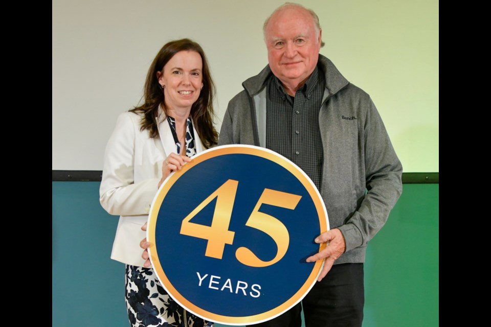 Gail Hunt, president and CEO of Royal Victoria Regional Health Centre, is shown with Dr. Thomas Armstrong, who was recognized for his 45 years of service.