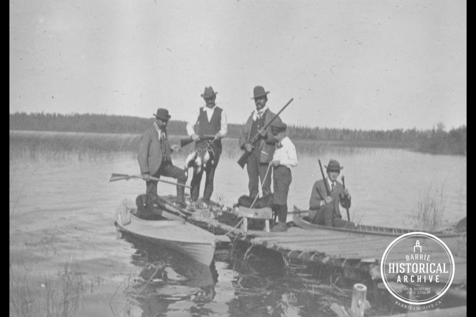 J. Shrubsole, FD Haight, unidentified man, F. Warren and Brown duck-hunting on Little Lake, 1902.